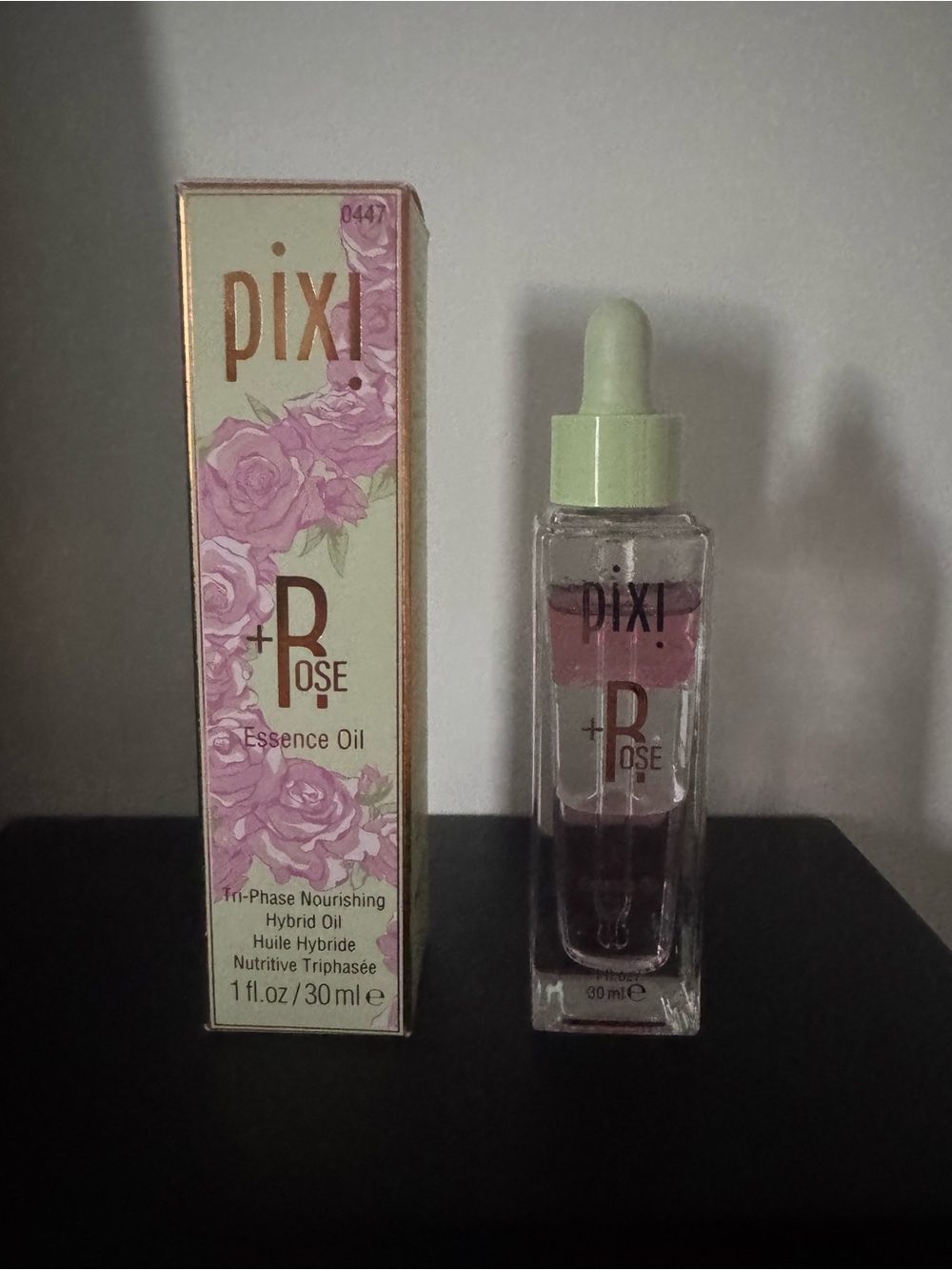 Pixi Rose Essence Oil in Pink and Green Packaging
